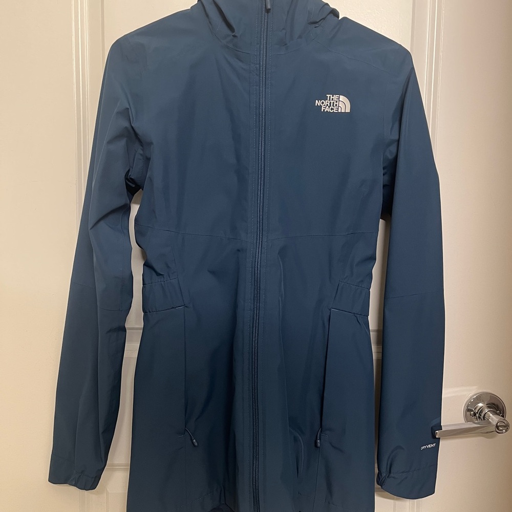 The North Face Blue Rain Jacket with Hood and Waterproof Material